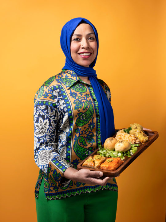 Portrait of Sara holding her food