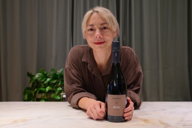 Golden Hour's Heather LaVine with a bottle of Champagne Bourgeois-Diaz, BD'3C Brut Nature. $76, if you're feeling splurgey. (Photo courtesy Golden Hour Wine)