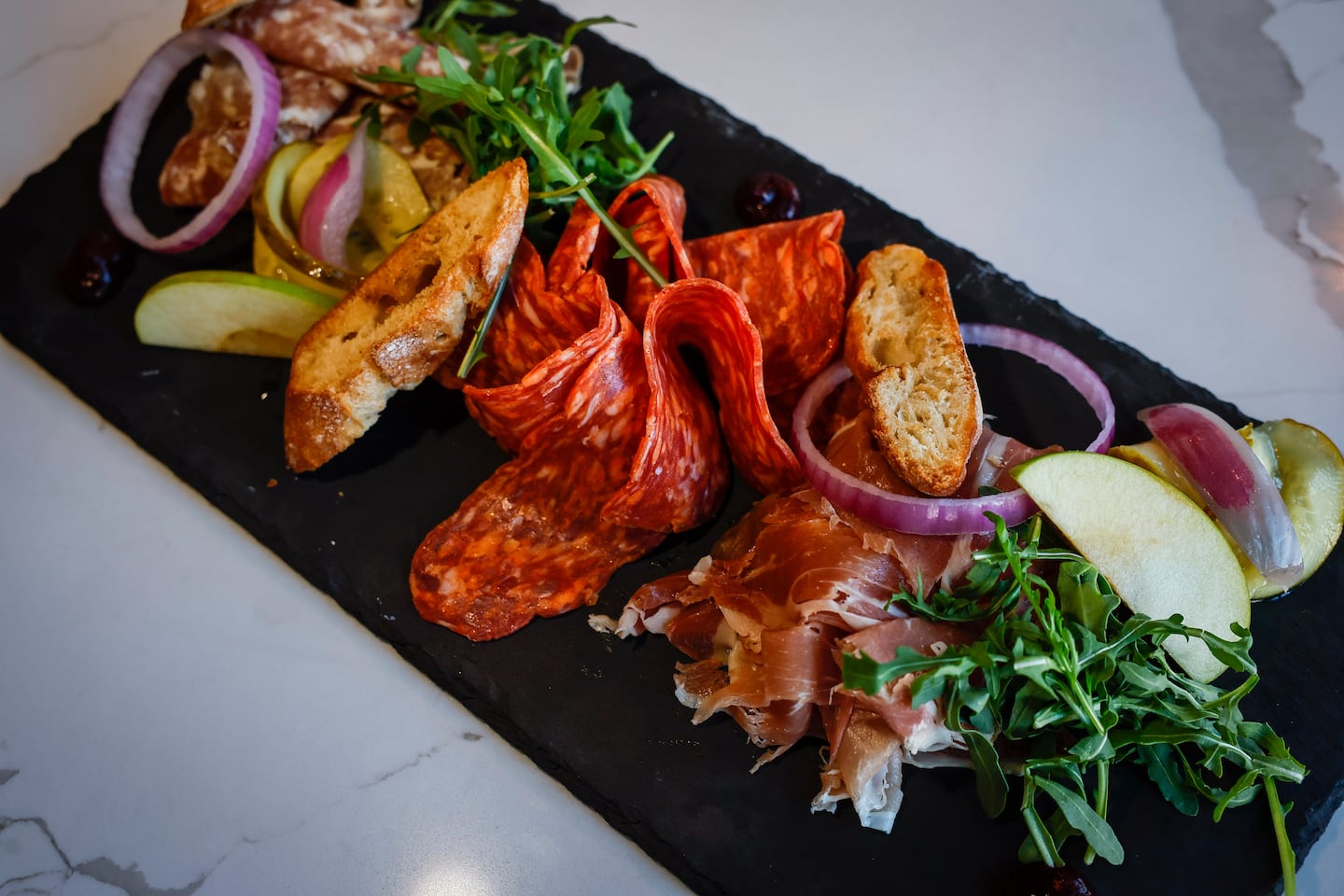 Assorted cured meats at Café Saint-Germain in Somerville.