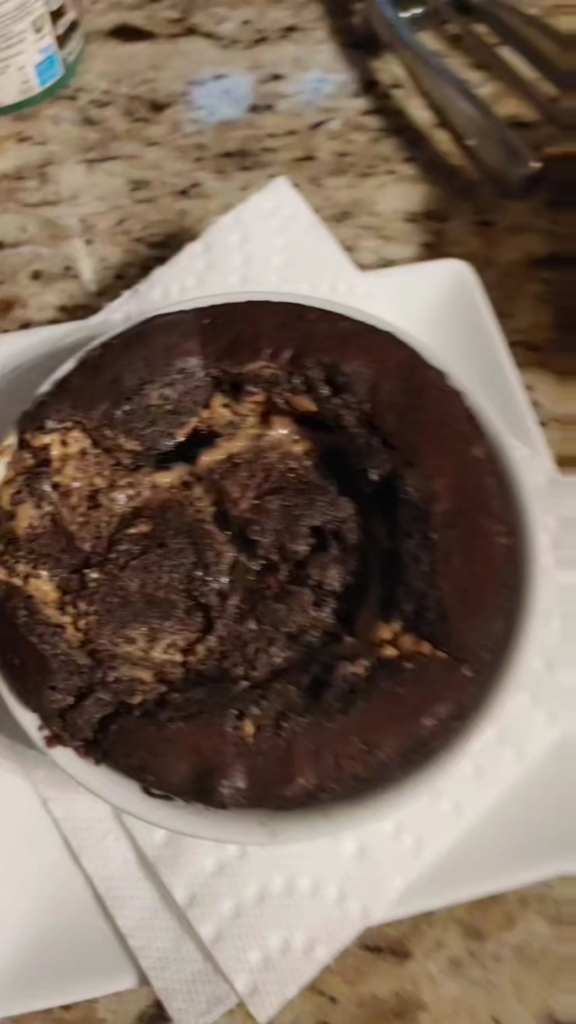 Warm chocolate peanut butter brownie with ice cream 🍫🥜