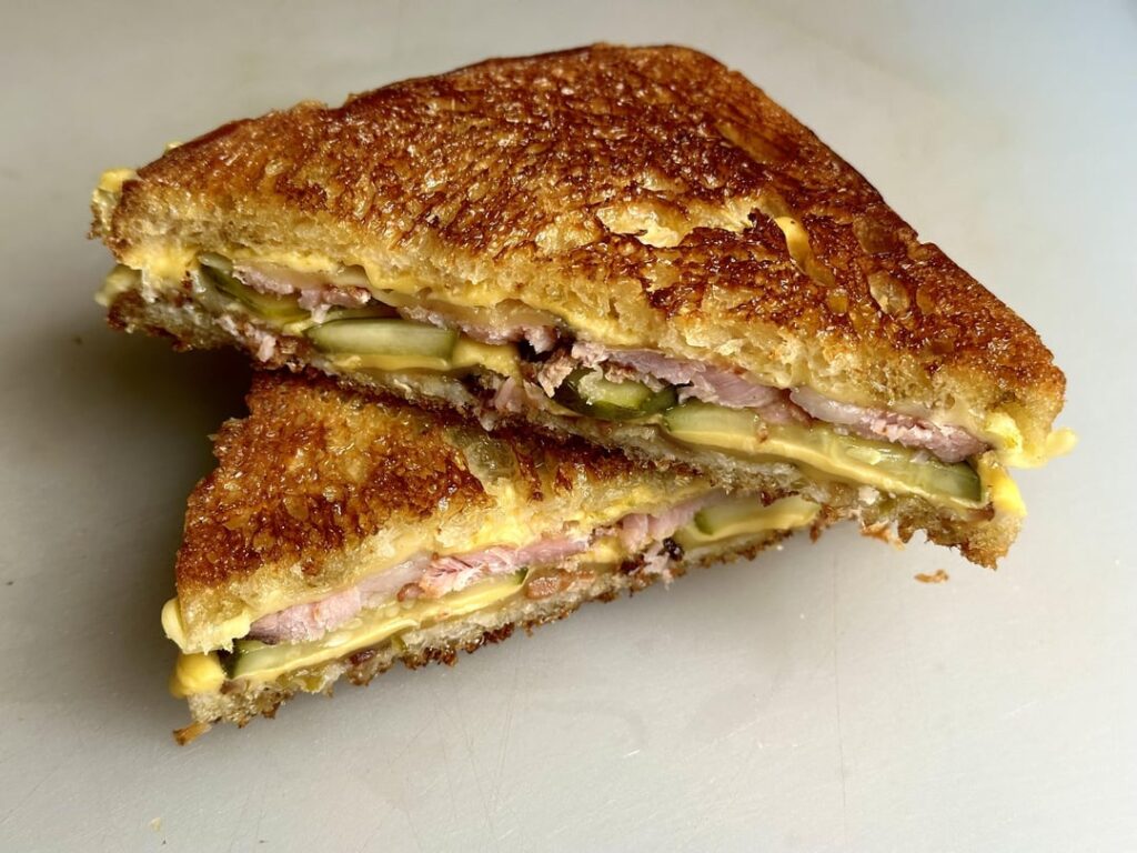 Sweet and spicy ham and cheese melt on homemade bread