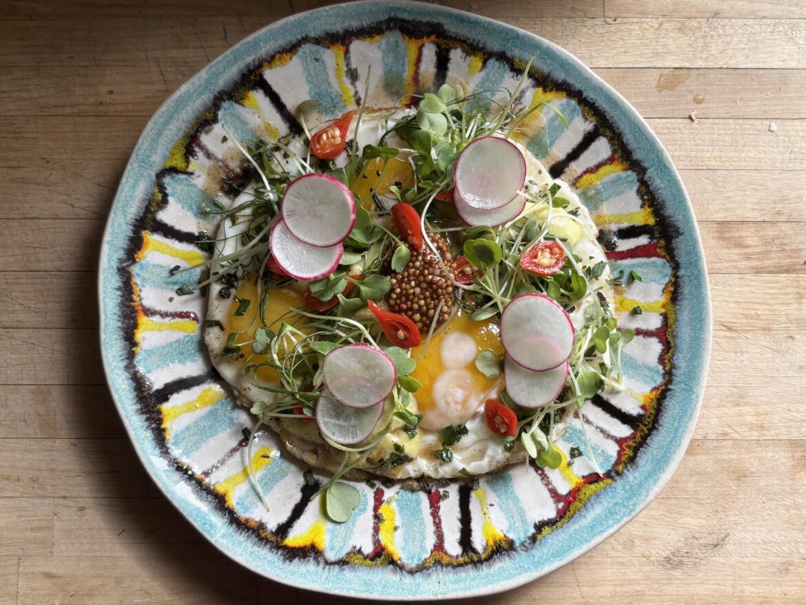 Sunny Eggs, Sage-Fennel Crème Anglaisse, micro arugula, fennel frond, sweety drop peppers, shaved radish, orange and brown butter vinaigrette, koslicks grainy Dijon