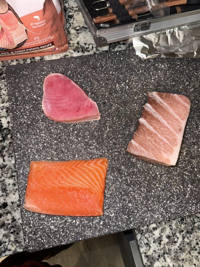 second time trying to make nigiri, cutting the fish is the hardest part :/ ora king salmon belly, otoro and yellow fin tuna