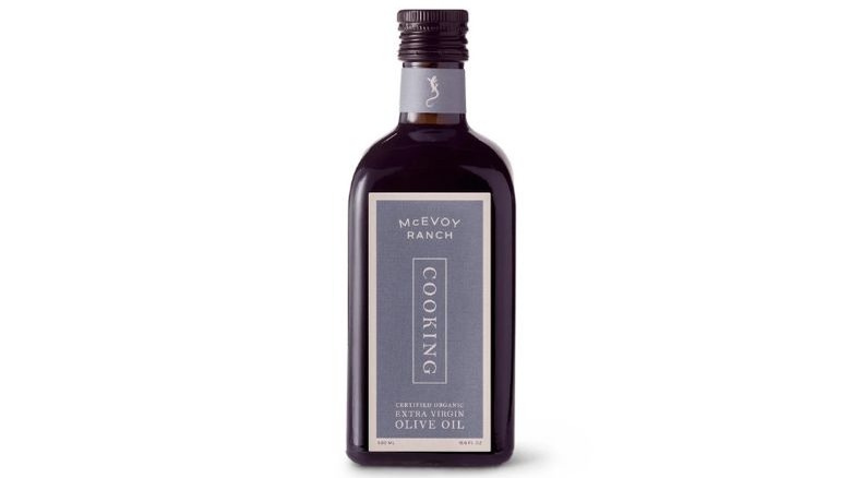 A bottle of McEvoy Ranch Extra Virgin Olive Oil against a white background