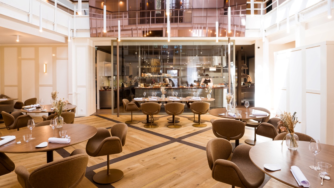 The atrium-like dining room at Rozó restaurant in Lille, France. ©Rozo