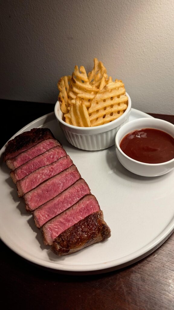 Dry Aged Prime Strip & Waffle Fries