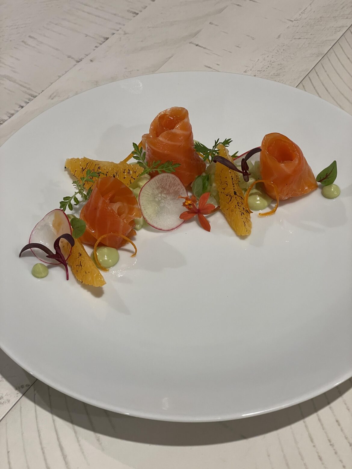 Cured Salmon Starter, Charred Orange, Cucumber, Avocado, Radish, Candied Orange Peel