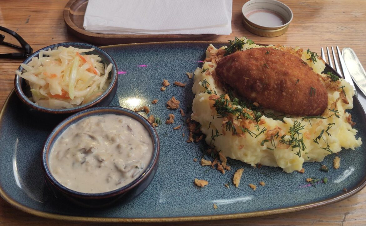 Котлета по-київськи (Chicken Kyiv) in Berlin — stuffed chicken fillet served with mashed potatoes, cabbage, and a creamy mushroom sauce