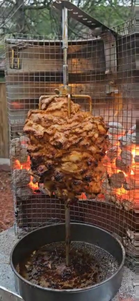 1 month update. Built a vertical version of the original grill + rotisserie attachment. Easy homemade shawarma.