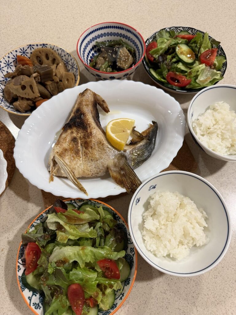 Grilled yellow tail collar, stewed chicken w/lotus root, braised eggplant, side salad w/ soy sesame dressing.