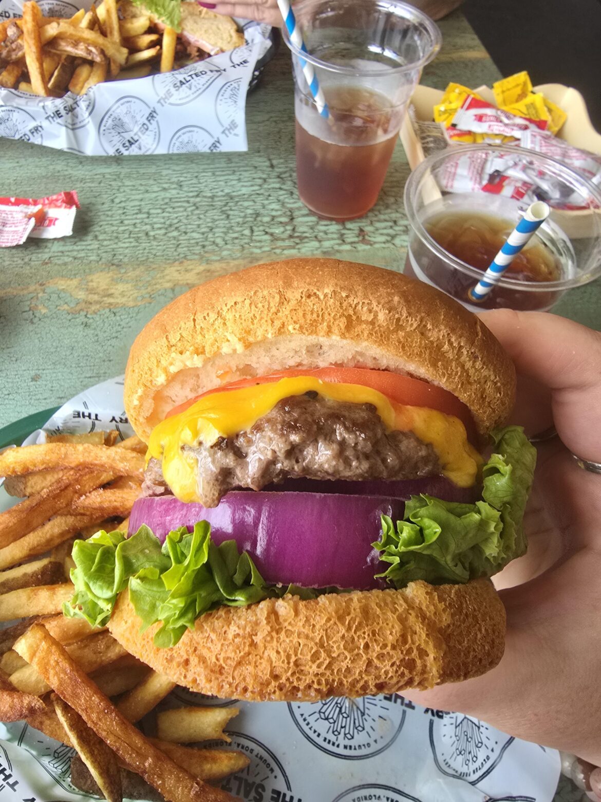 This huge onion slice on my cheeseburger was amazing