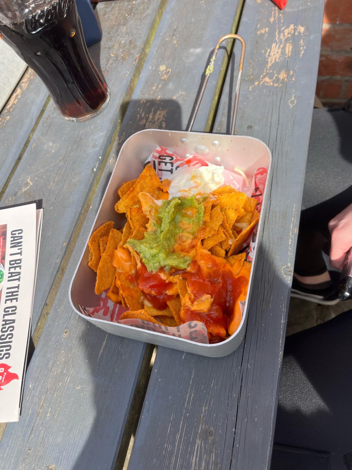 Nachos served in a mess tin