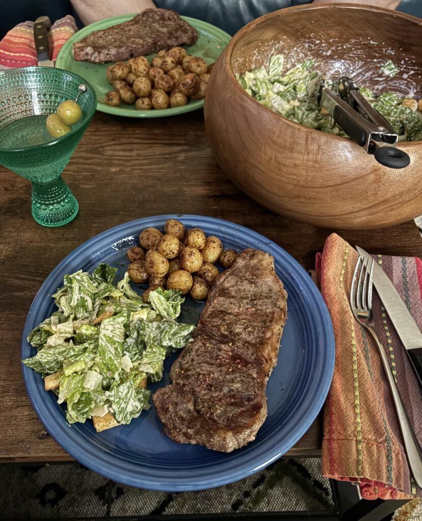 grilled NY strip, roasted potatoes, caesar salad, and a dirty martini. my perfect Saturday night dinner
