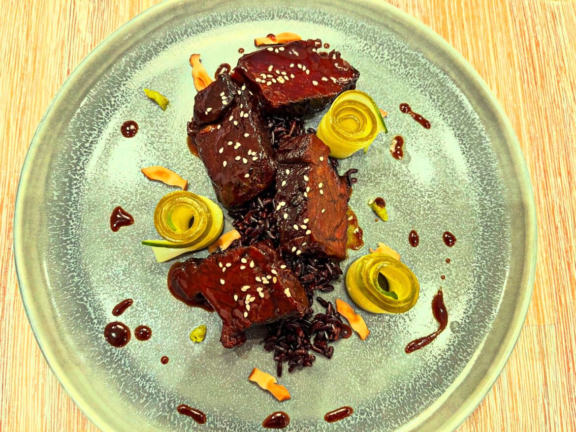 Miso, sake and soy braised and glazed short rib. Black rice. Pickled cucumber and shiitake. Wasabi.