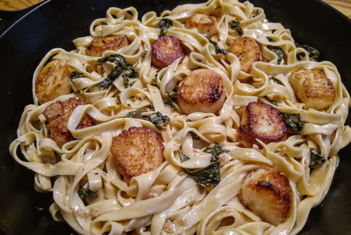 Pan seared scallops with homemade fettuccine and sherry cream sauce