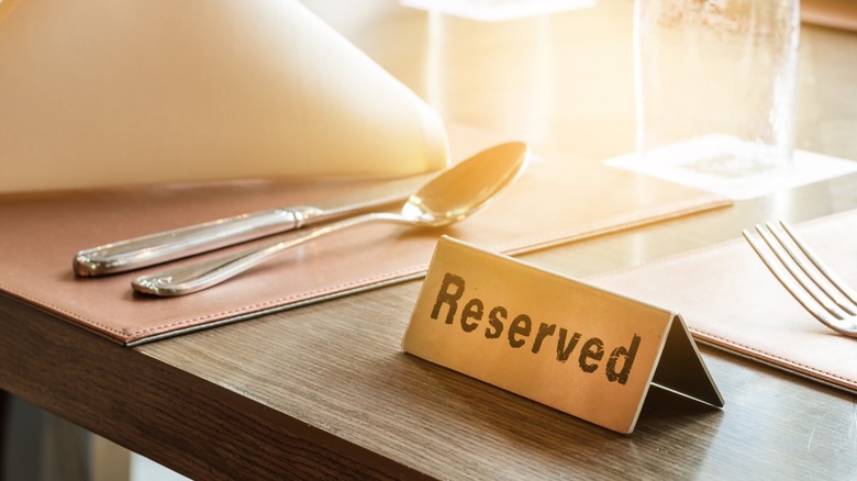 Table with reserved sign