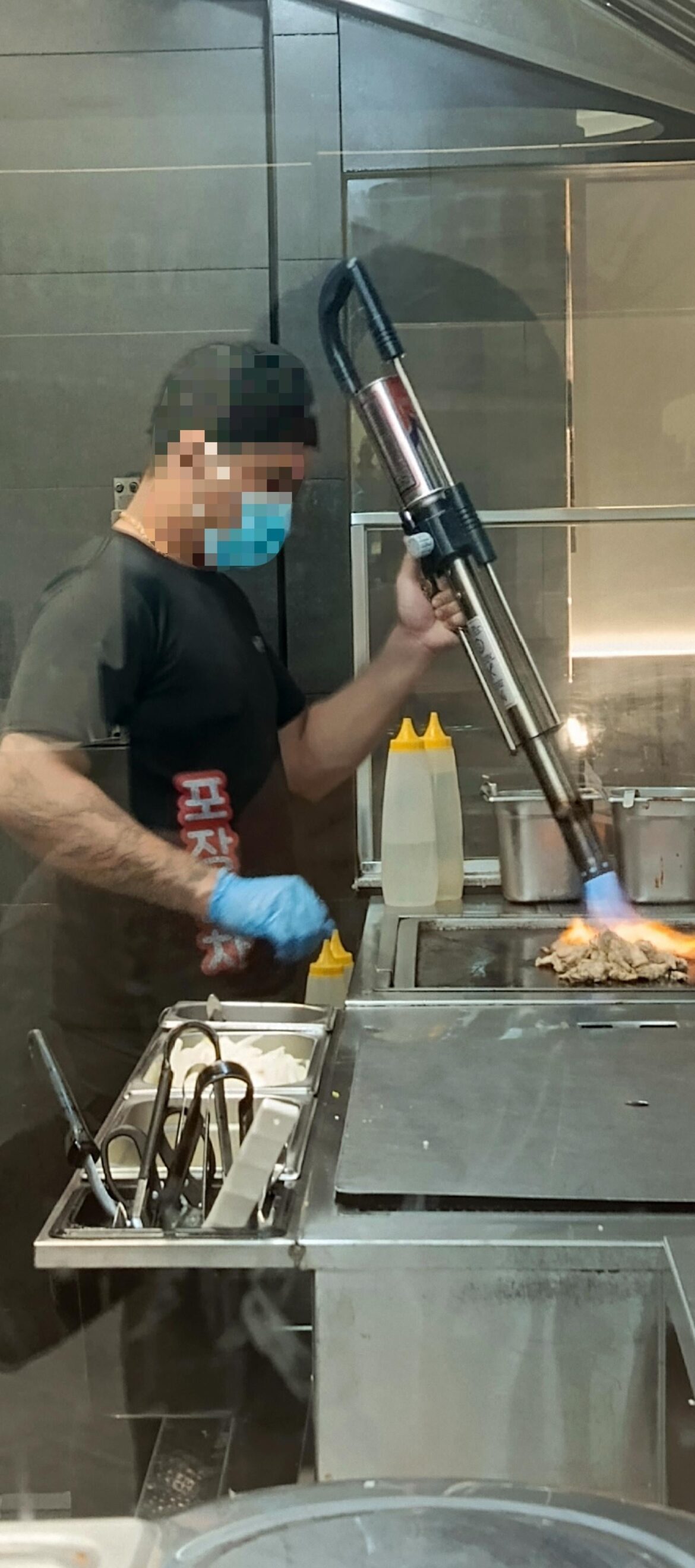 Absolute unit of a cooking blowtorch OP saw at a Korean bulgogi restaurant. They used it to sear their meats.