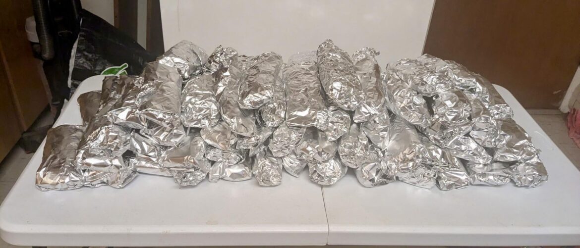 79 "breakfast" burritos ready to freeze