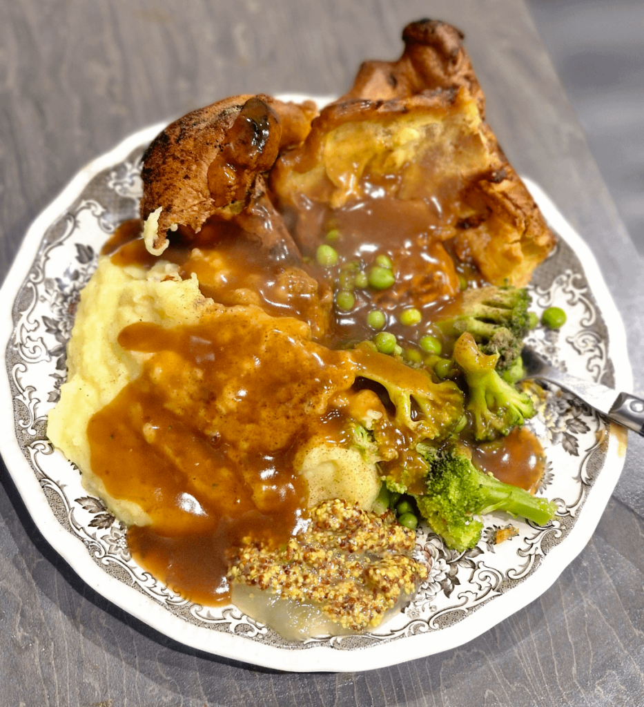 Big steaming plate of toad in the hole