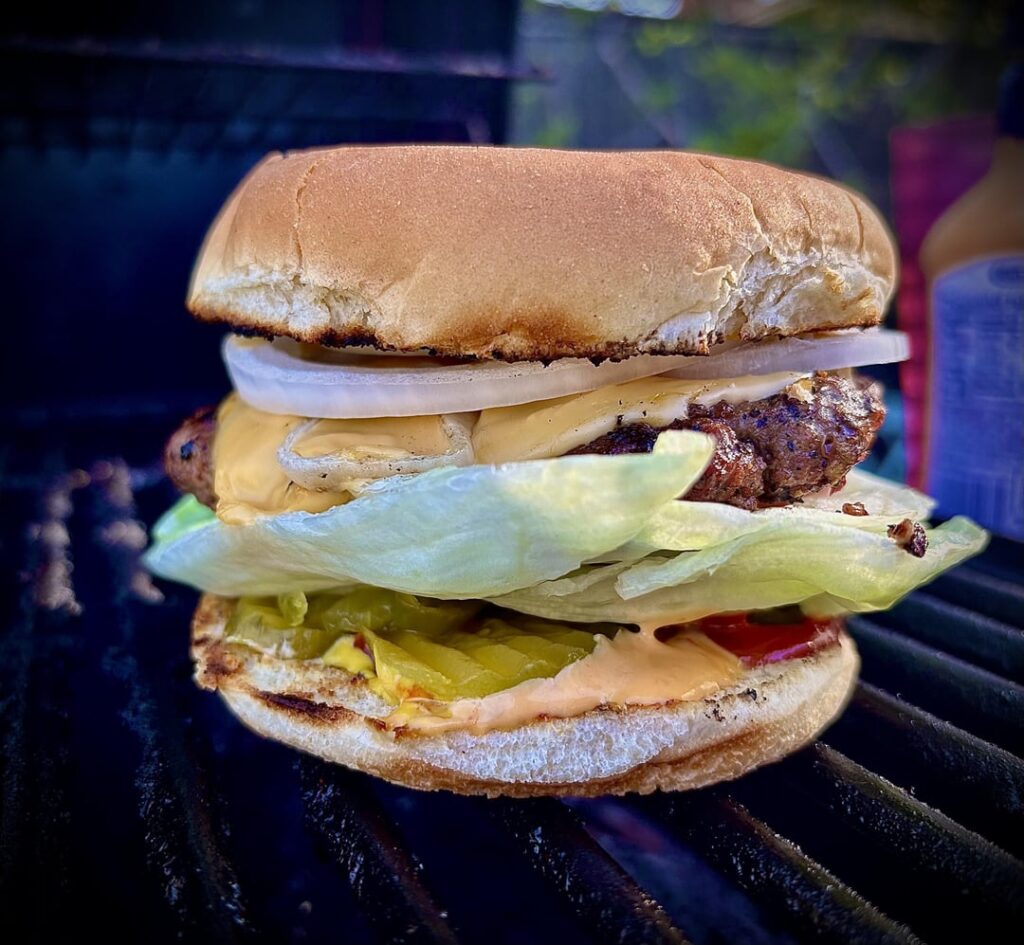 Another Classic Burger on the grill! With a nice and toasty bun