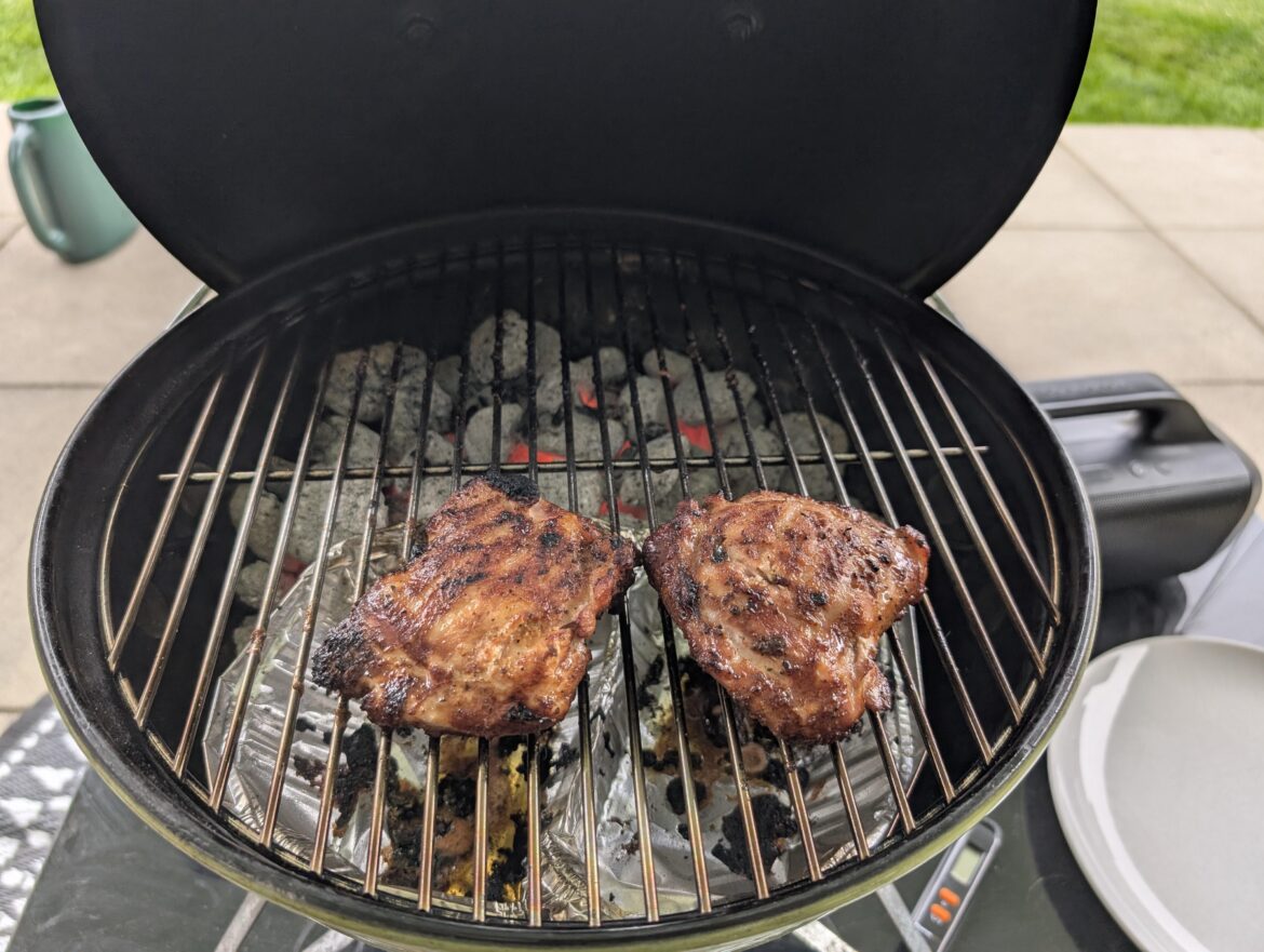 Some chicken thighs on the ol' smokey.