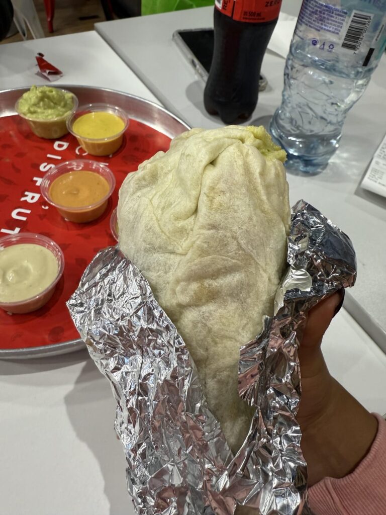 Not sure how many calories this has, help pls:( (white rice, black beans, guac, corn, pico de gallo, lettuce and shredded beef)