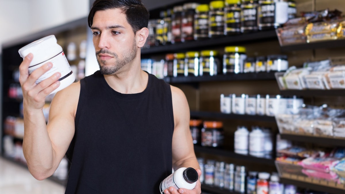 Man at supplements store