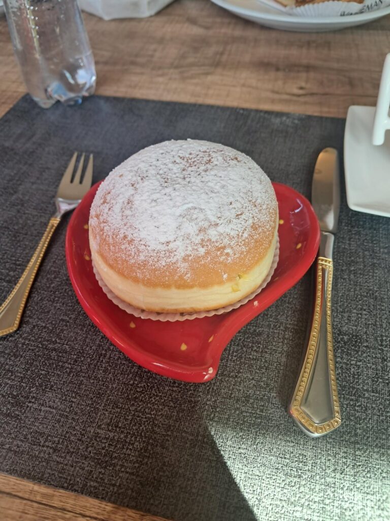 Is 350 a good estimate for this custard cream filled donut? Berliner. Small fork and notmal sized knife