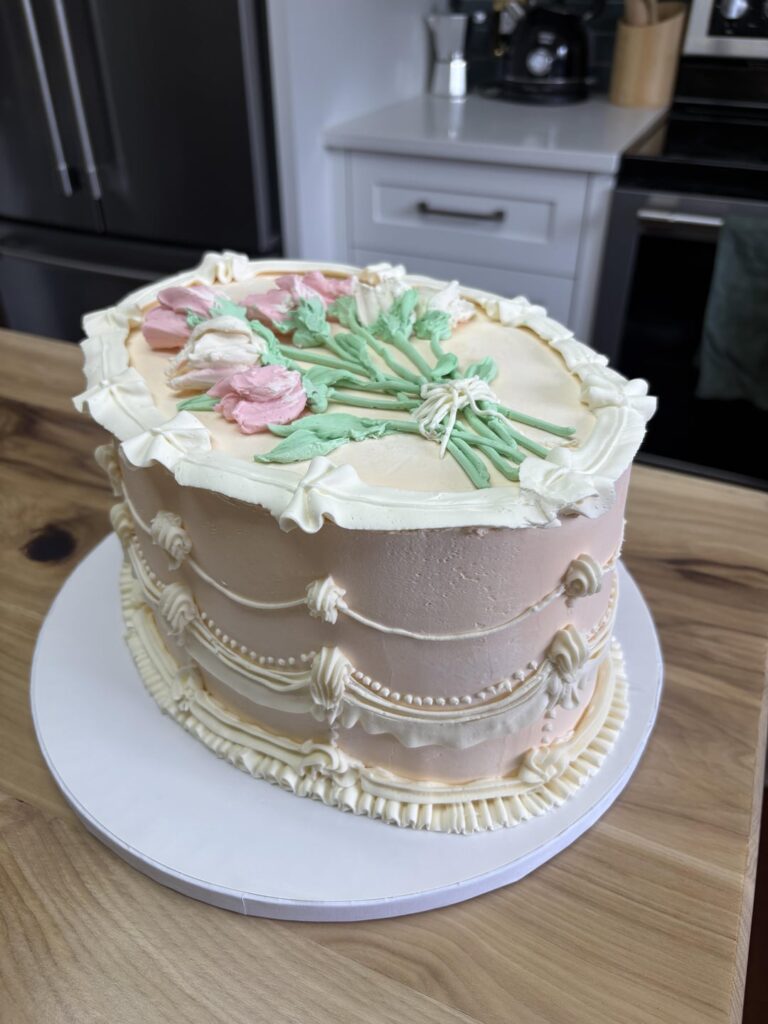 Lemon cake with raspberry buttercream and vanilla Swiss meringue for the decoration.
