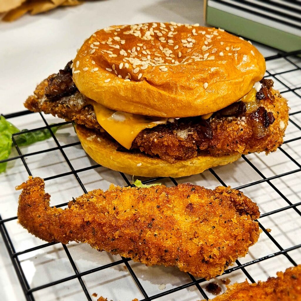 Panko fried chicken sandwich with caramelised onion