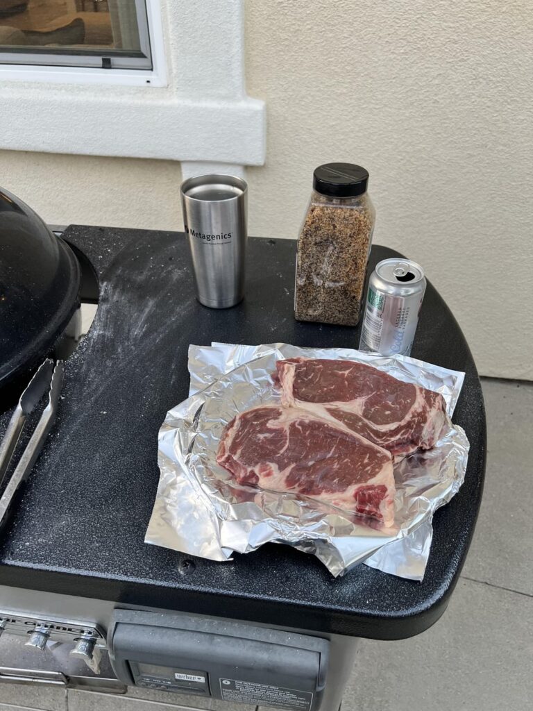 4pm I’m at work. Wifey texts me saying she set some of my frozen ribeyes out to defrost and could I make them for dinner? Thanks to Daylight Savings, I can start the coals when I get home at 5:30 and still get dinner done before dark. Yes Wifey, yes I can. King of the grill! How’d I do?