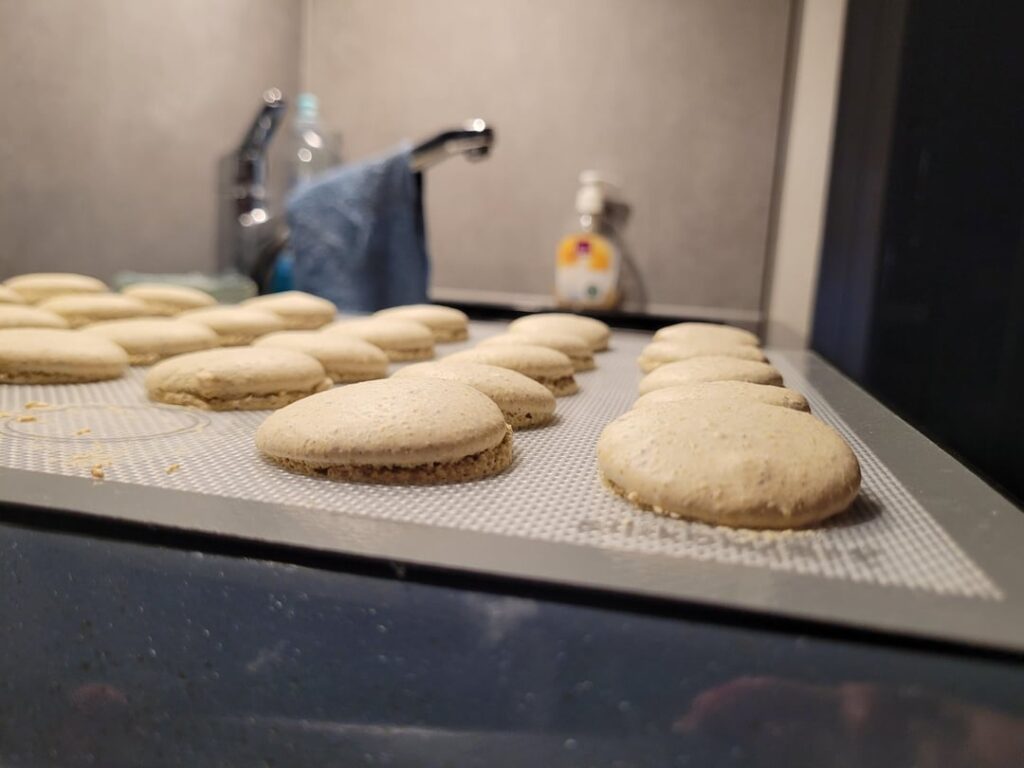 Macarons rise unevenly in random directions (only happens sometimes)