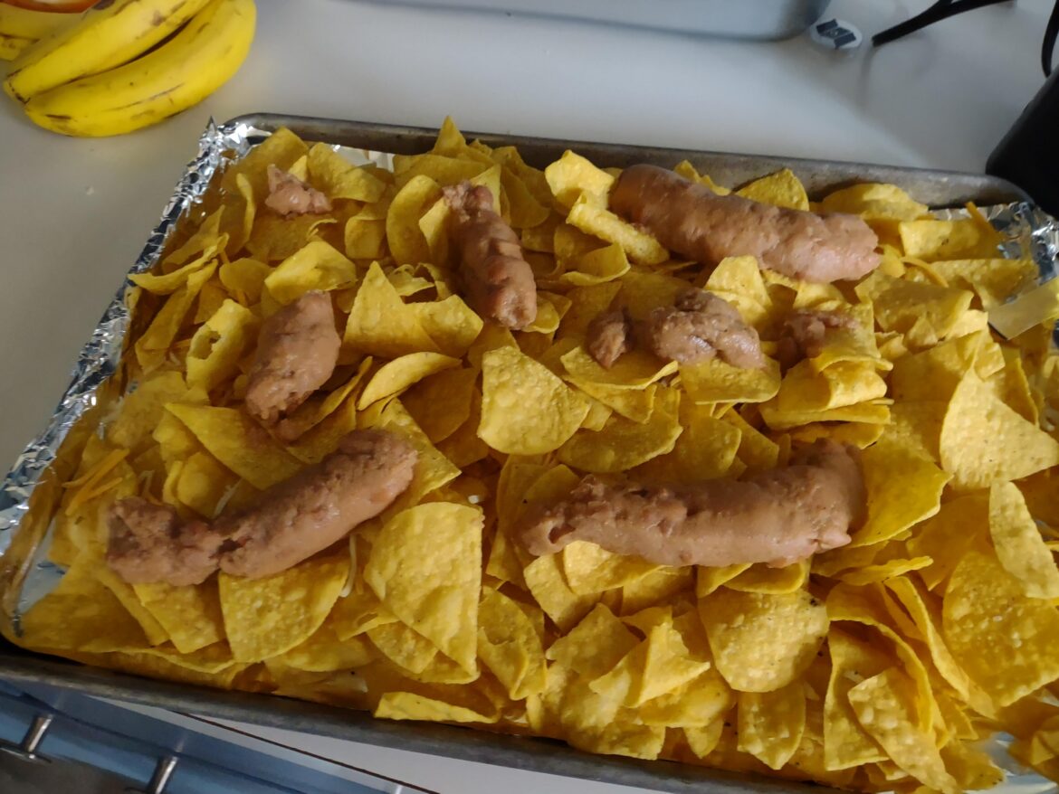 Was making nachos at home and thought..."what's an easier way to spread refried beans onto my nachoes?" A piping bag with a large hole is definitely not IT.
