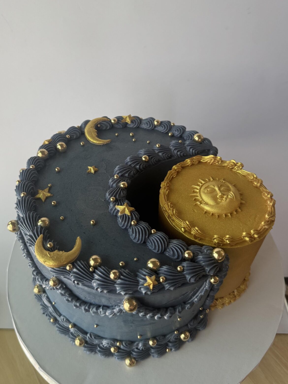 my attempt at the viral sun and moon cake! (i need a bigger backdrop for cakes lol)