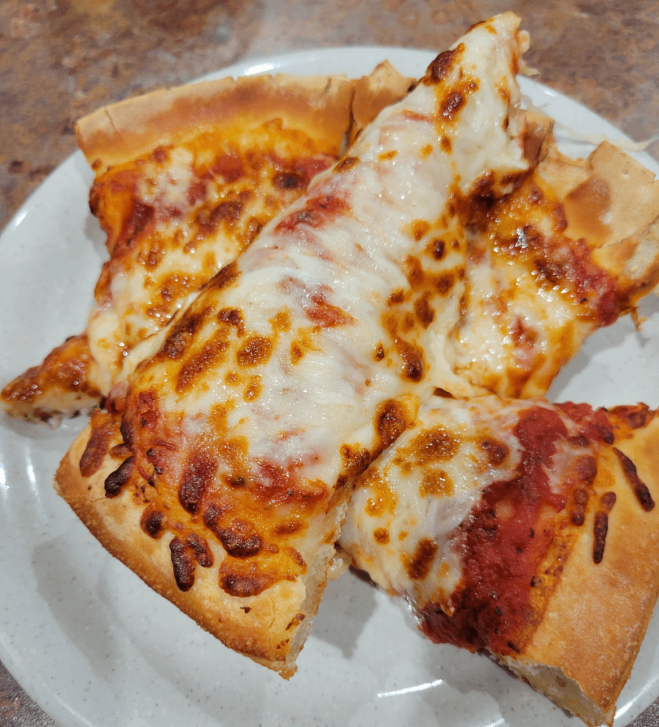 A pile of extra cheese pizza!