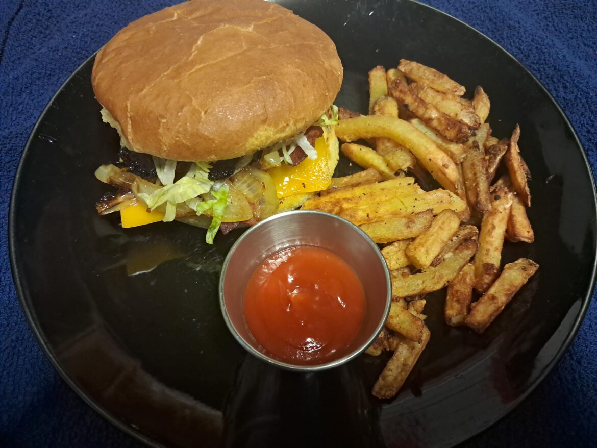 The burger sub would get mad at me for not letting the cheese melt enough but it's melted now. But it's a BBQ bacon cheese burger with caramelized onion on potatoes buns.