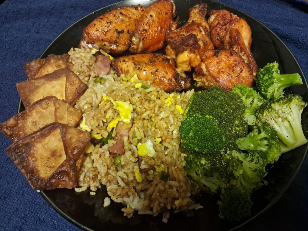 Half a pint of vodka later I made fried wings, fried rice, crab rangoons and broccoli.