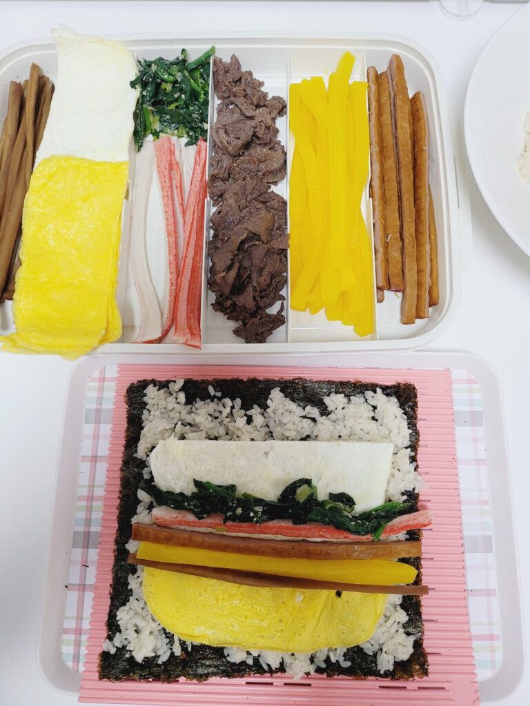 Rolling gimbap with tiny hands