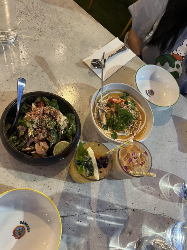 calories in thai beef massaman curry, poached chicken salad & passionfruit/lychee lemonade drink?