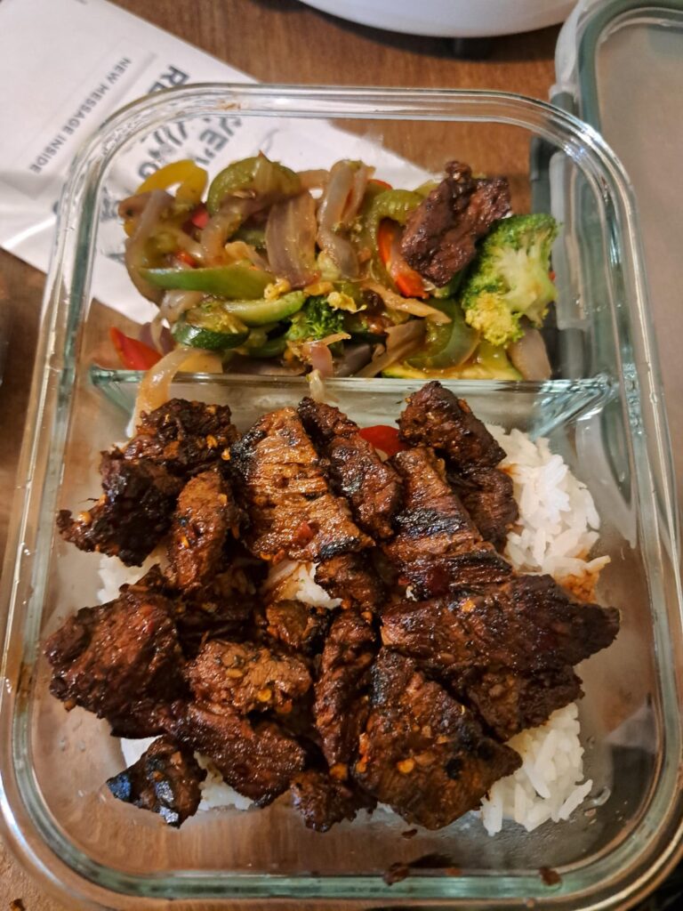 Angus beef with assorted veggies and rice.