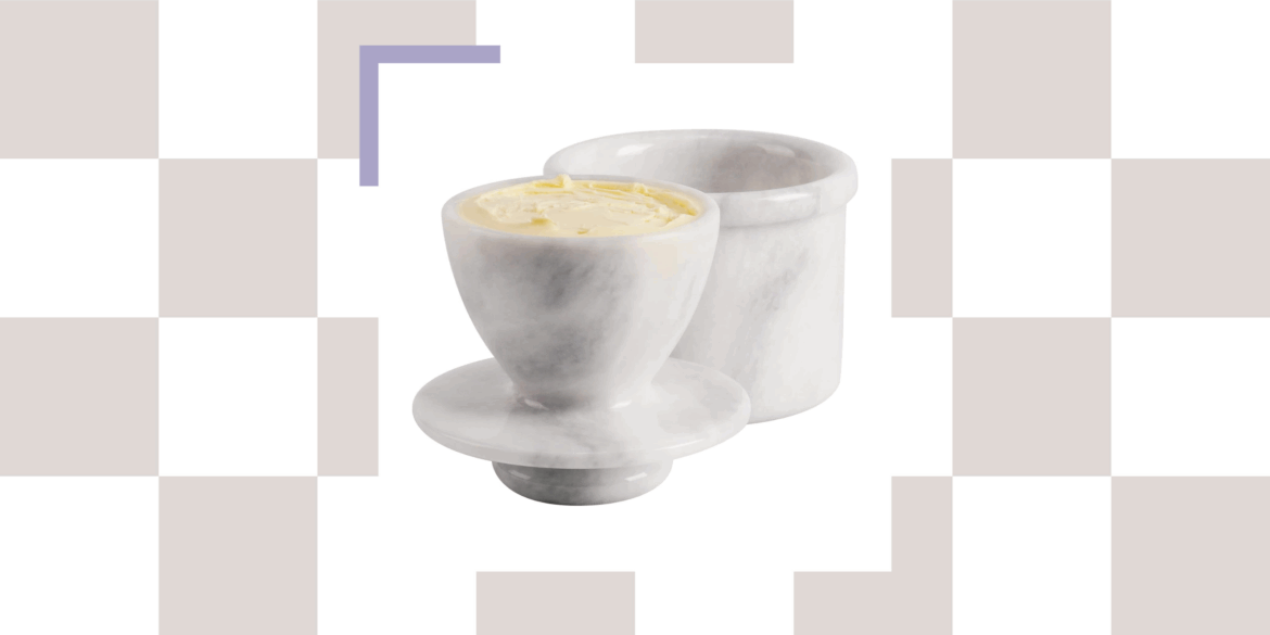 A marble butter bell on a chequered template