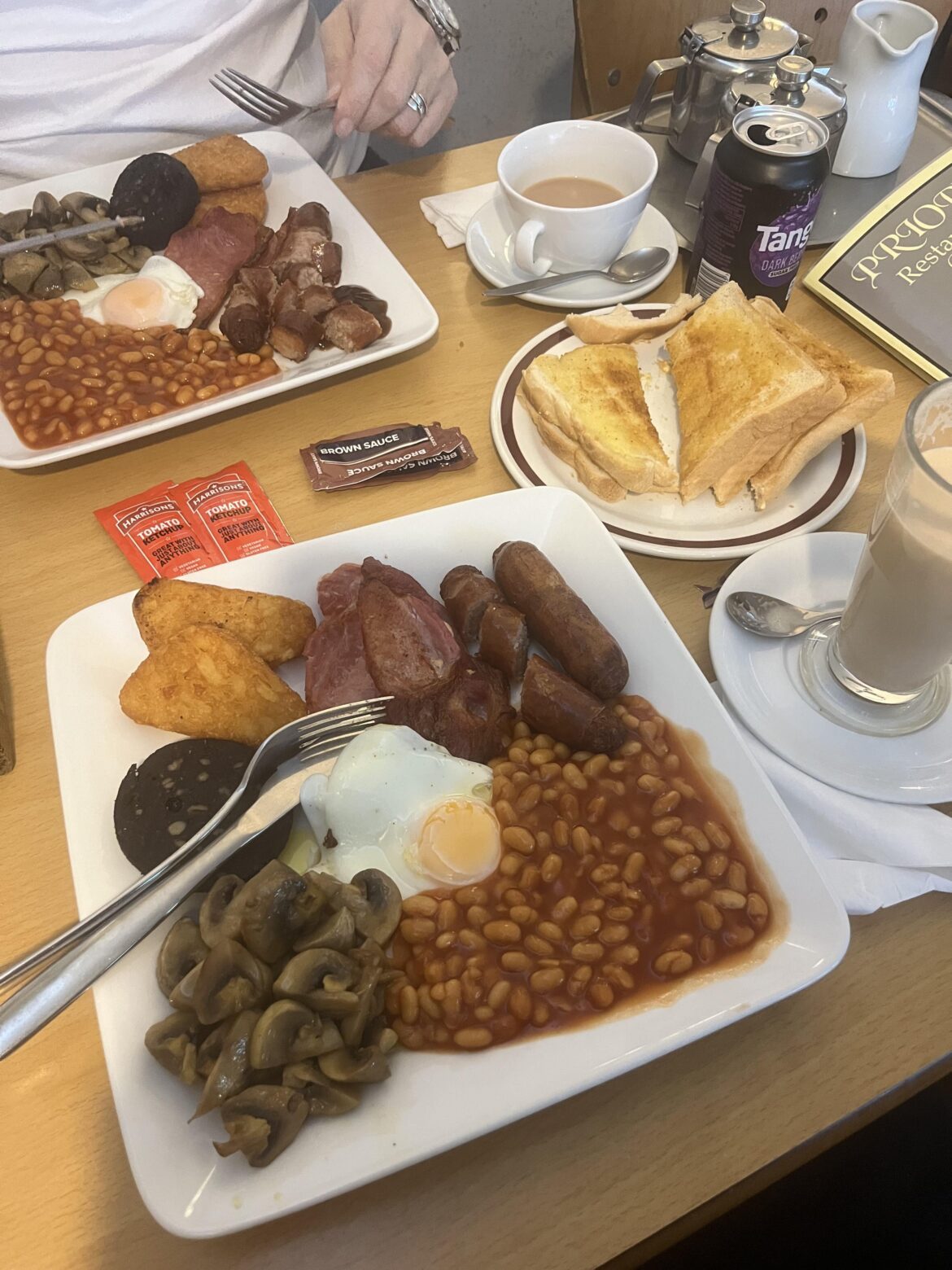 Priory cafe, Cardigan. £20 roughly for the lot 👌 (£8ish each breakfast)