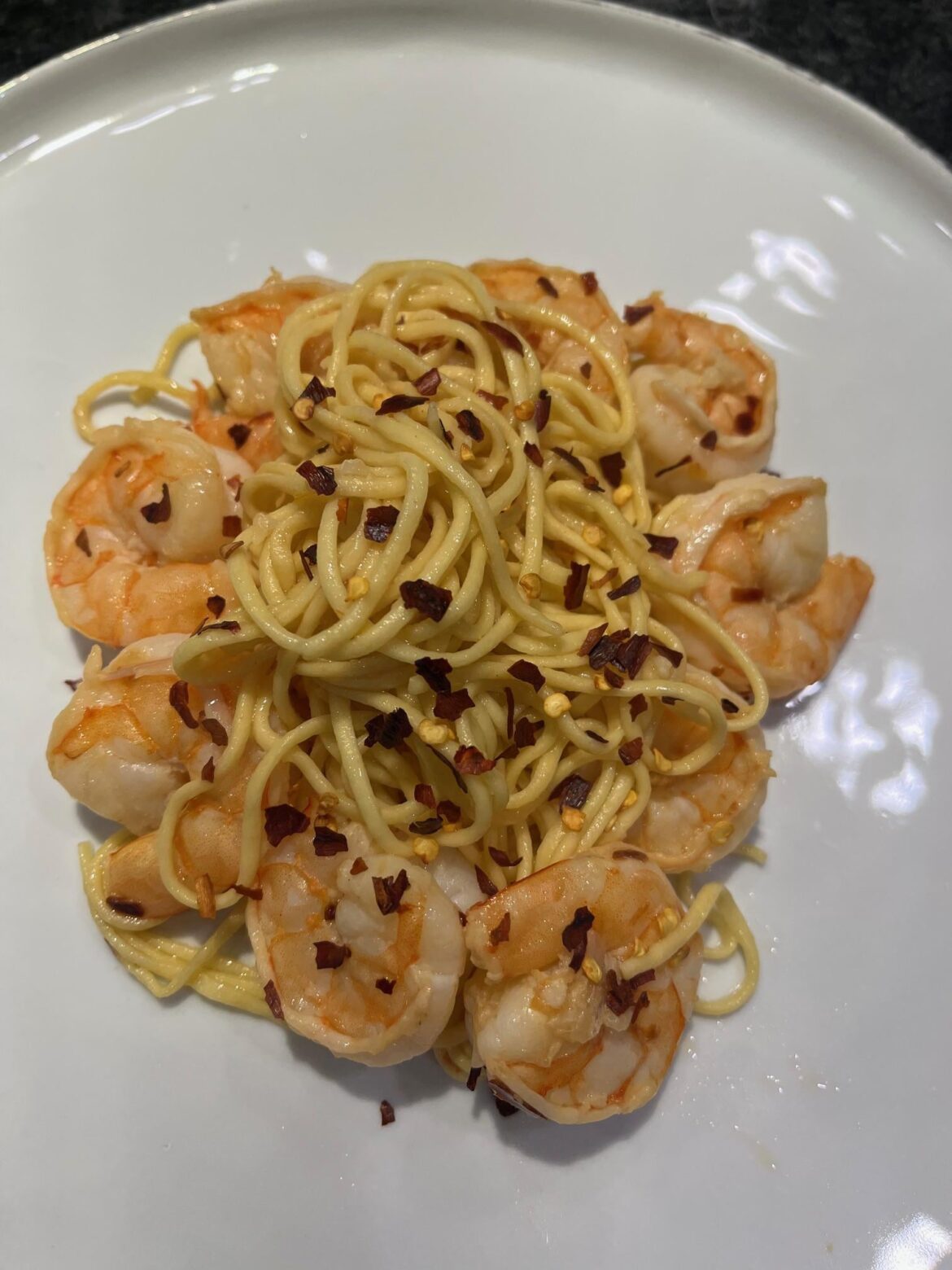 Lemon garlic shrimp with homemade angel hair (Semolina/00/eggs) and crushed red.  Mangia!!