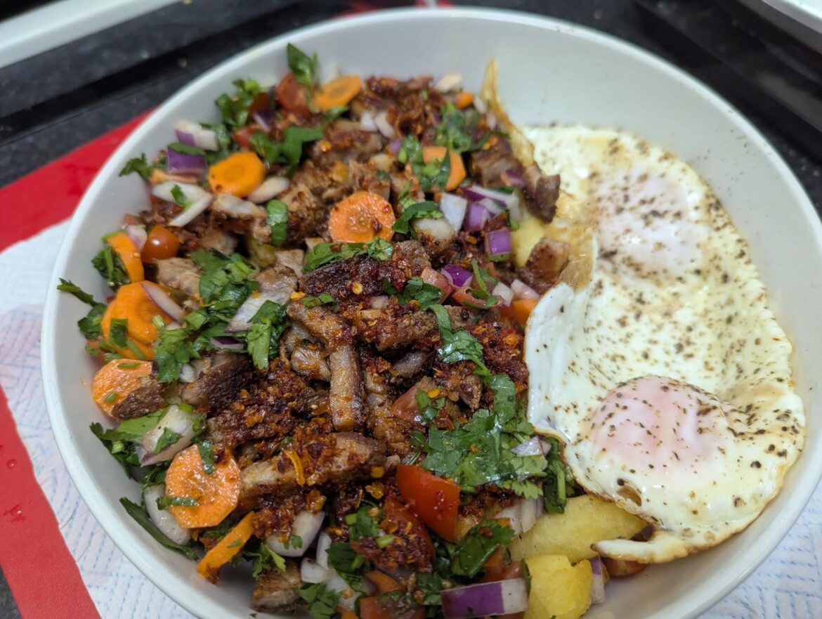 Chips and Pork Shoulder Steak with Chilli Onion Crunch, Salsa/Salad and Fried Eggs