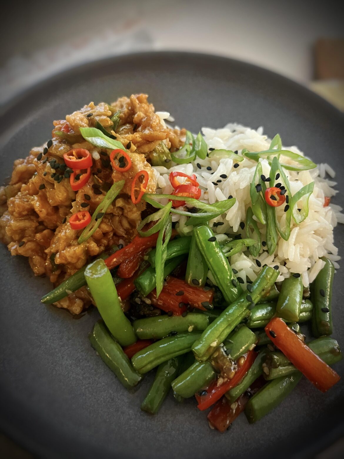 Sweet and spicy ginger sesame chicken, with garlic butter green beans & white rice