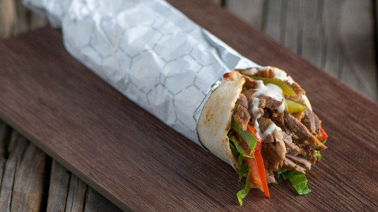 chicken shawarma wooden board