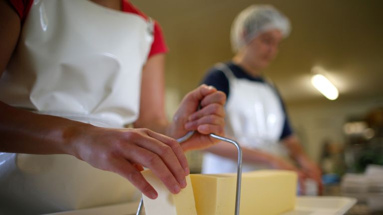 Butter is being spread very thinly in France