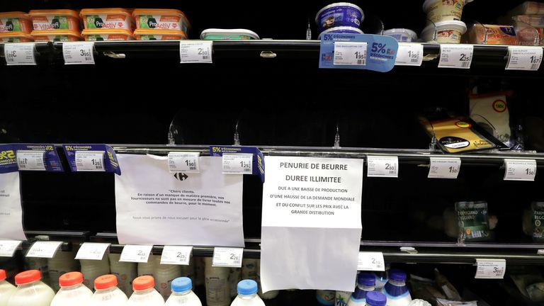 Supermarket shelves in France have signs on them apologising for the lack of butter available