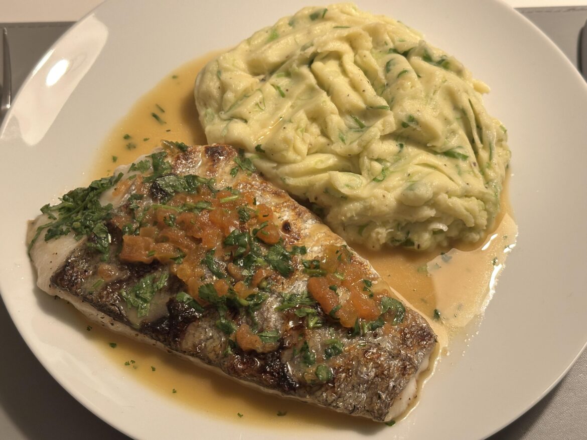 Hake with soy butter sauce and spring onion mash
