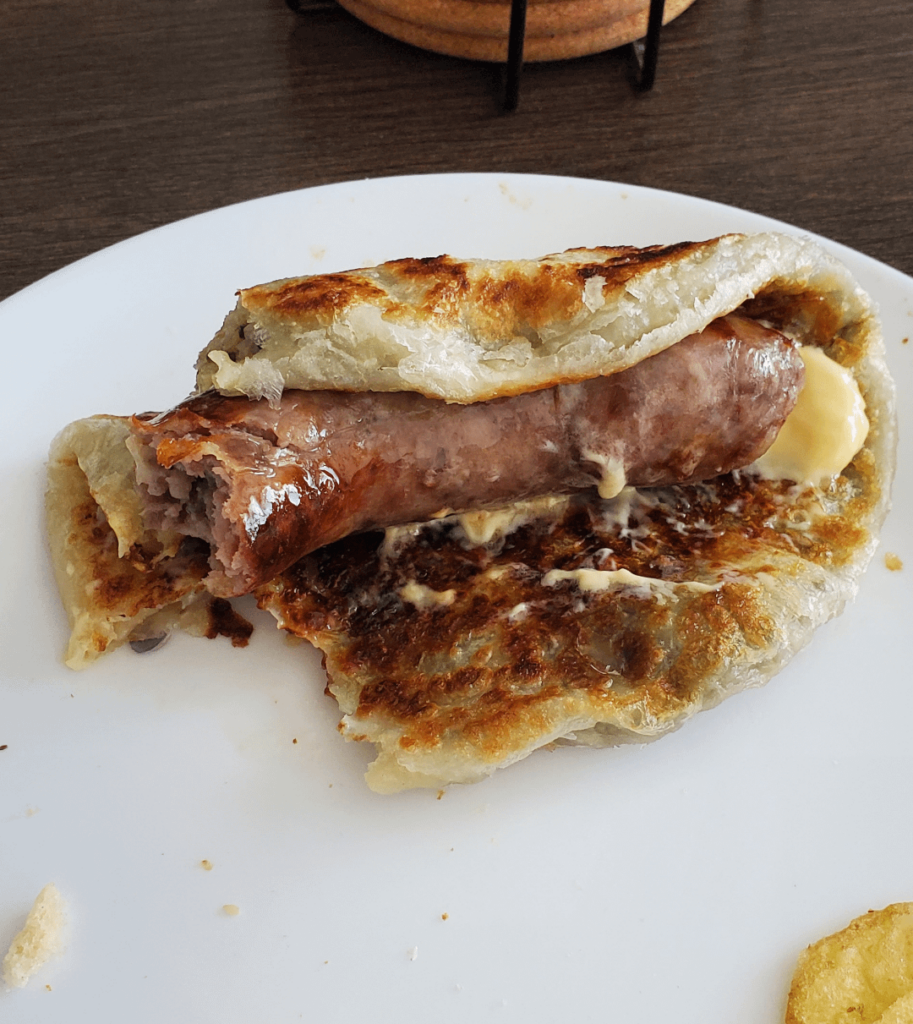 used a scallion pancake as a bun for my brat bro I'm hammered